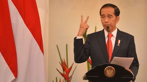 Indonesia president picks top cleric as running mate in 2019 election Indonesia president picks top cleric as running mate in 2019 election