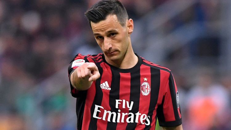 Soccer - Atletico boost strike force by signing Kalinic from AC Milan