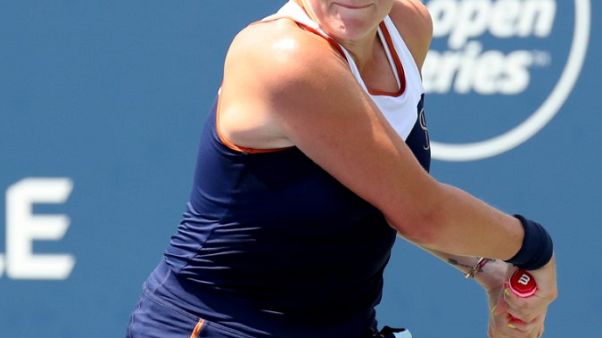 Tennis - Halep outlasts Pavlyuchenkova to reach third round in Montreal Tennis - Halep outlasts Pavlyuchenkova to reach third round in Montreal