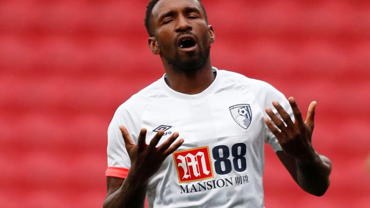 'Goal-obsessed' Defoe wants to rise in league scoring chart