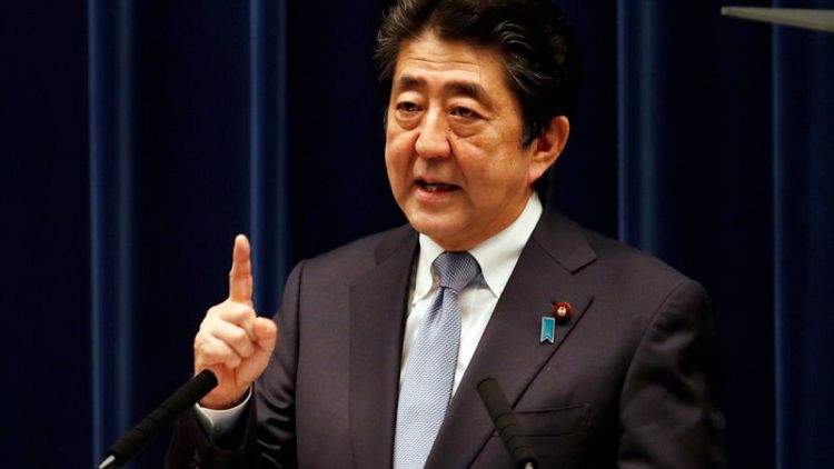 Japan PM Abe on track for extended term despite rival's bid