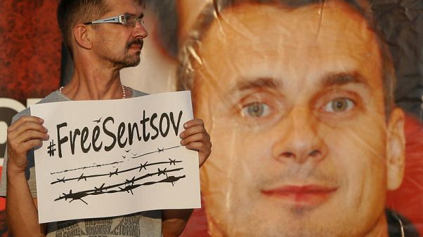 Macron says he discussed hunger striker Sentsov with Putin Macron says he discussed hunger striker Sentsov with Putin