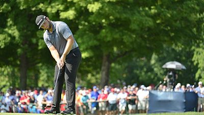 Golf - Rahm incurs penalty stroke for stepping on ball