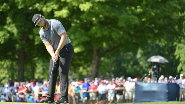 Golf - Rahm incurs penalty stroke for stepping on ball Golf - Rahm incurs penalty stroke for stepping on ball