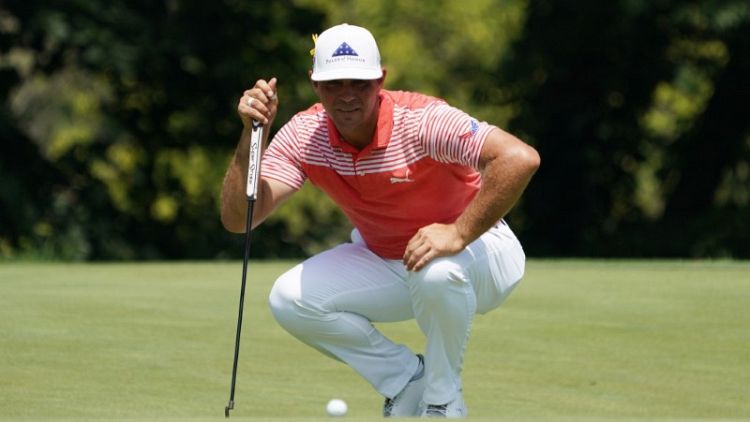Woodland leads as Koepka, Schwartzel match PGA record with 63