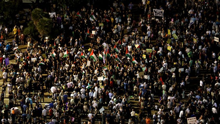 Israel's Arab minority rallies against new nation-state law