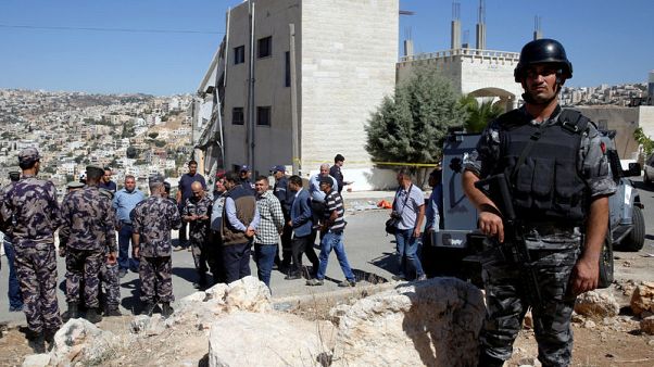 Four security members, at least three militants, killed in Jordan shoot out Four security members, at least three militants, killed in Jordan shoot out