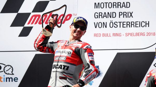 Lorenzo staves off Marquez challenge to win Austrian GP Lorenzo staves off Marquez challenge to win Austrian GP