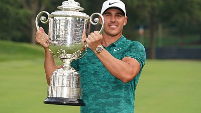 Koepka wins PGA Championship by two strokes from Woods Koepka wins PGA Championship by two strokes from Woods