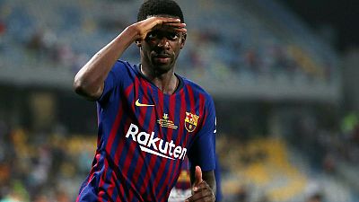 Super Cup hero Dembele puts troubled Barca past behind him