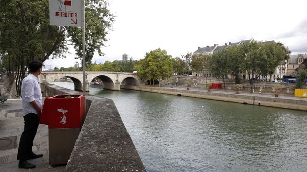 Paris residents peeved at very public eco-friendly urinals Paris residents peeved at very public eco-friendly urinals