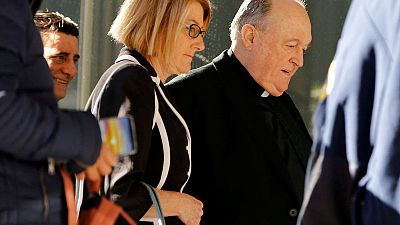 Australian archbishop begins home detention over sex abuse cover-up