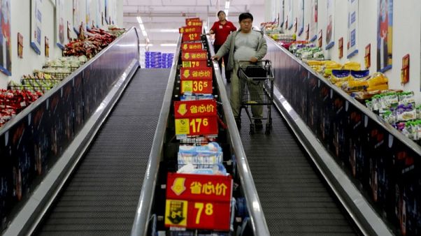 China's economy cools further, investment growth at record low China's economy cools further, investment growth at record low