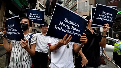 Pro-China groups protest outside Hong Kong press club over 'separatist' speech Pro-China groups protest outside Hong Kong press club over 'separatist' speech