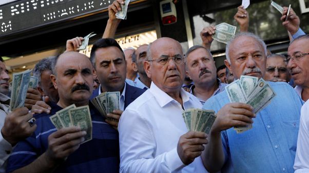 Erdogan says Turkey will boycott U.S. electronics, lira steadies Erdogan says Turkey will boycott U.S. electronics, lira steadies