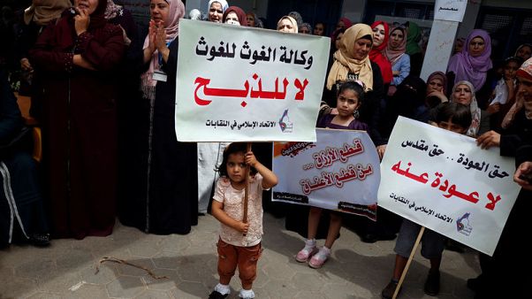 Palestinians wary as U.N. may not open schools in time Palestinians wary as U.N. may not open schools in time