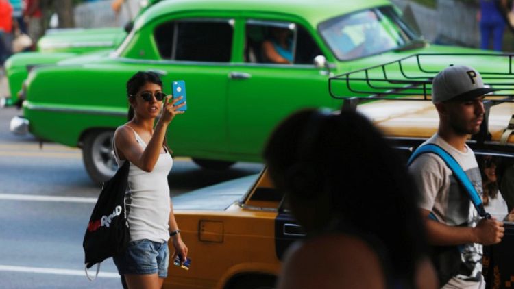 Cubans cheer as internet goes nationwide for a day
