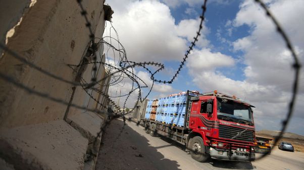 Israel lets food, goods back into Gaza as Egypt pushes truce Israel lets food, goods back into Gaza as Egypt pushes truce
