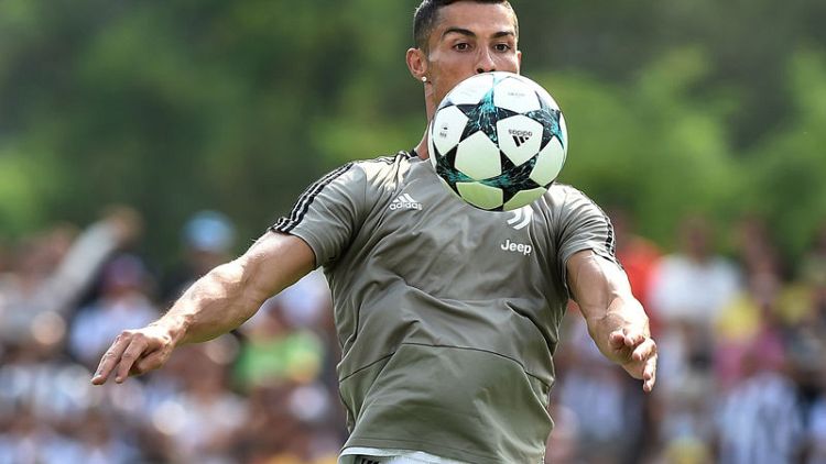 Soccer - Ronaldo raring to go as Serie A kicks off amid optimism
