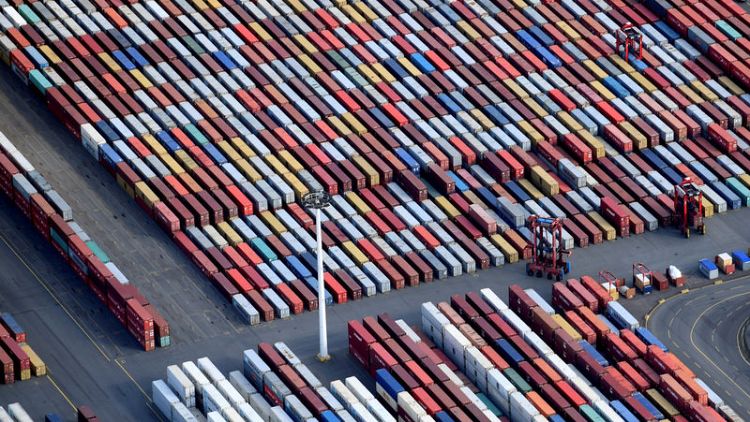 Euro zone June trade surplus falls by less than expected