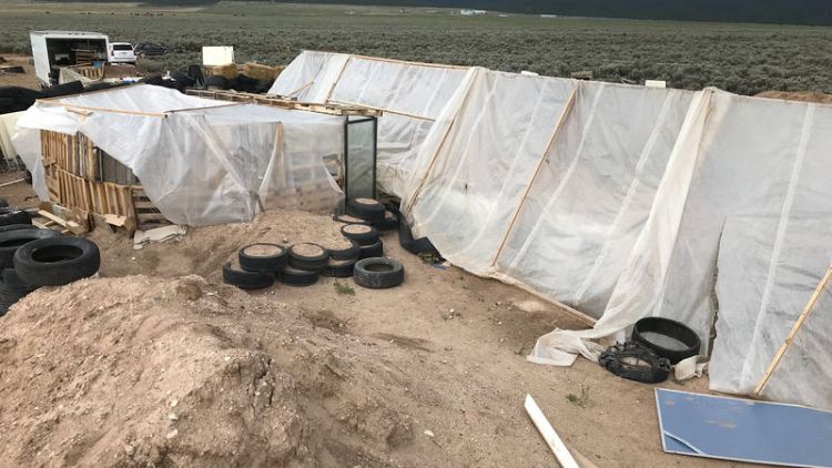Body found at New Mexico compound identified as missing boy