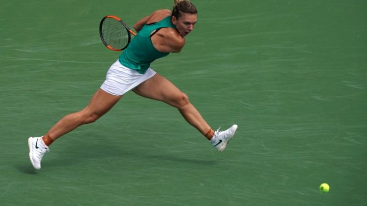 Halep downs Barty to move into quarter-finals