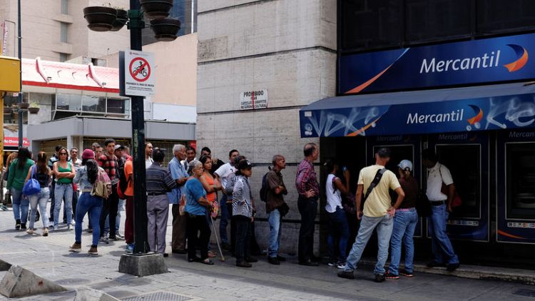 Venezuelans rush to shops before monetary overhaul
