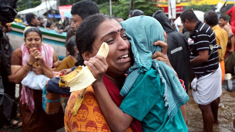 India's Modi sees Kerala's plight as flood death toll climbs