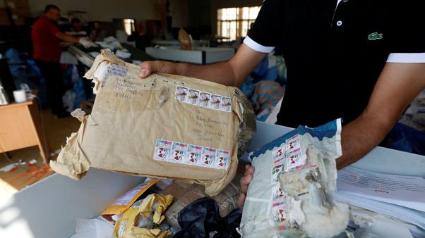 Eight years late, Palestinian mail arrives in West Bank Eight years late, Palestinian mail arrives in West Bank