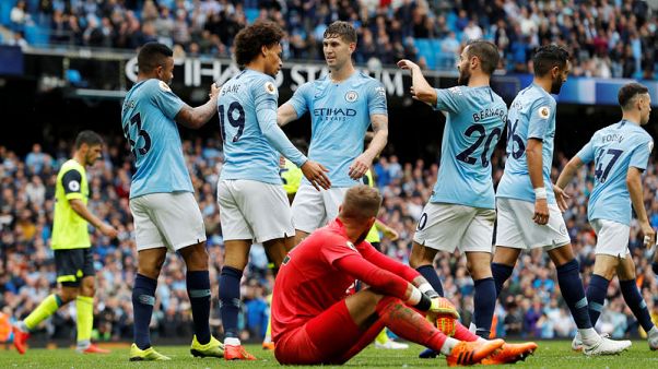 Aguero hat-trick as free-scoring City rout Huddersfield Aguero hat-trick as free-scoring City rout Huddersfield