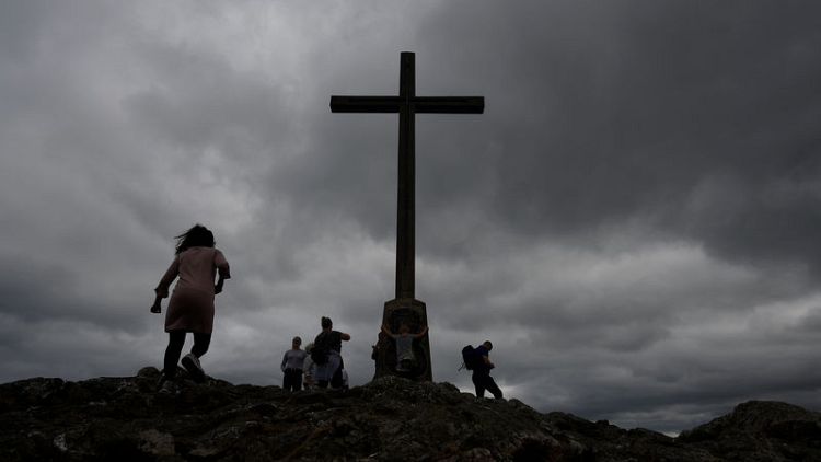 Irish abuse survivors await Pope's arrival with scepticism