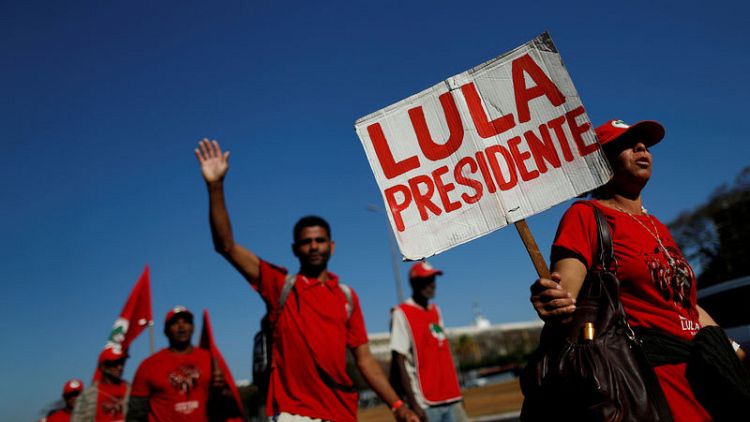 Brazil poll shows jailed Lula extending lead for October election