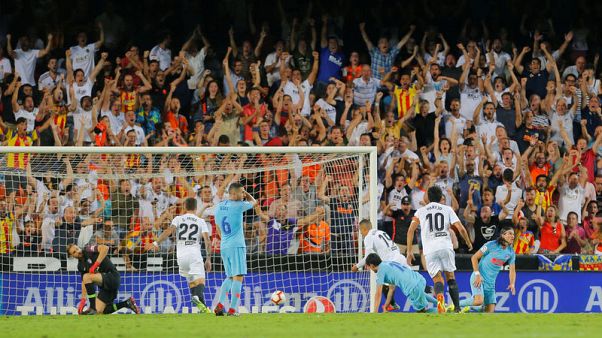 Valencia hold Atletico in thrilling Liga draw Valencia hold Atletico in thrilling Liga draw