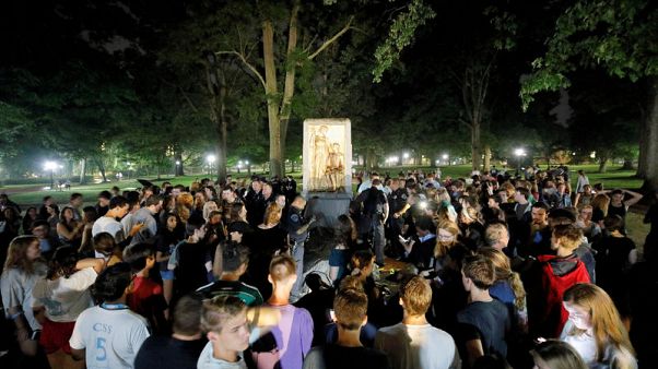 Protesters topple Confederate soldier statue in North Carolina Protesters topple Confederate soldier statue in North Carolina