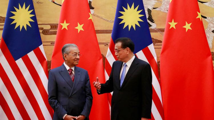Malaysian PM Mahathir says China-backed rail, pipeline projects cancelled for now - reports