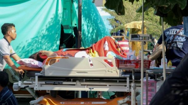 Séismes en Indonésie : les secours s'activent auprès des survivants Séismes en Indonésie : les secours s'activent auprès des survivants
