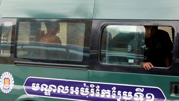 Two Cambodian journalists facing spying charges freed on bail Two Cambodian journalists facing spying charges freed on bail