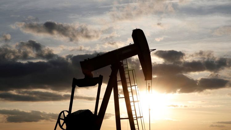 Oil rises on U.S. crude inventories, Iran sanctions worries
