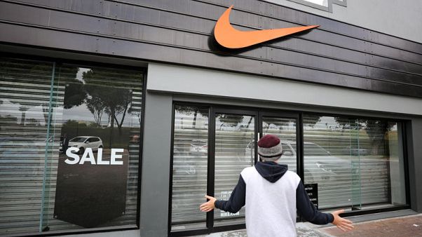 Nike stores closed in South Africa amid outcry over racist web post Nike stores closed in South Africa amid outcry over racist web post