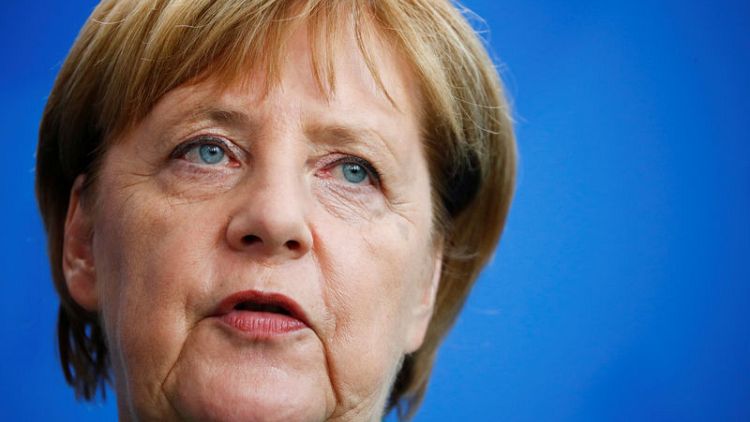 Merkel cool on EU independent payment system to save Iran deal