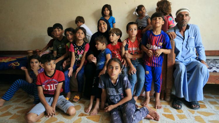 After IS killed her sons, Iraqi grandmother fends for 22 children