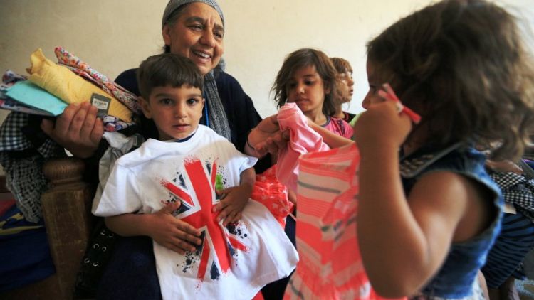 جدة عراقية ترعى 22 حفيدا بعد أن قتلت الدولة الإسلامية أباءهم