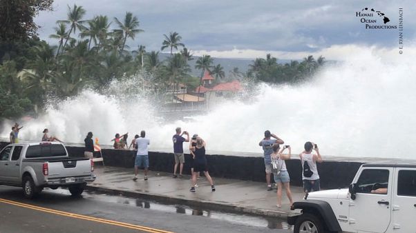 Lane weakens into tropical storm as flood hazard lingers over Hawaii Lane weakens into tropical storm as flood hazard lingers over Hawaii