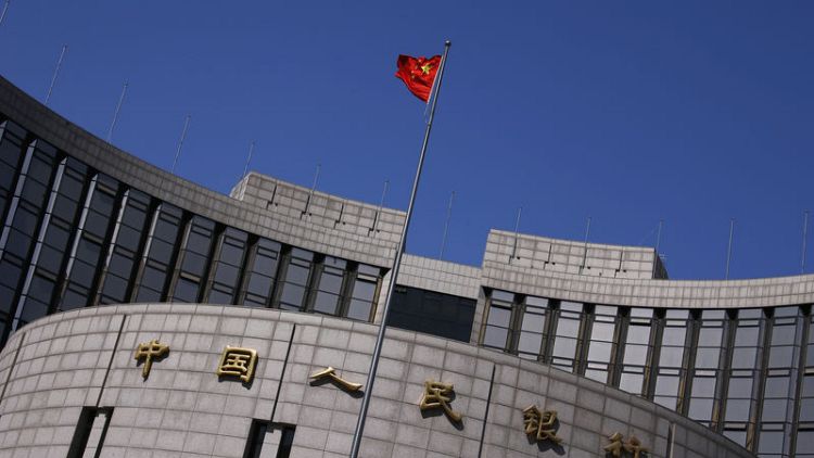 China central bank warns against illegal fund-raising by virtual currency, blockchain firms