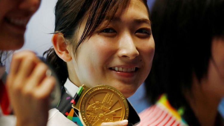 اليابانية ايكي تحقق إنجازا بالفوز بست ذهبيات للسباحة بألعاب آسيا