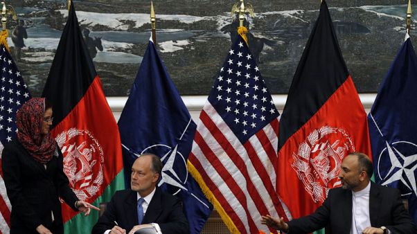 Afghanistan's national security adviser resigns in break with president Afghanistan's national security adviser resigns in break with president