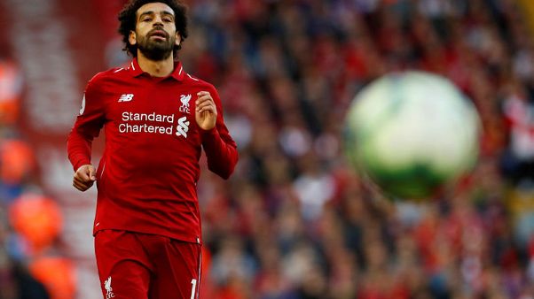 Salah strike sinks Brighton and sends Liverpool top Salah strike sinks Brighton and sends Liverpool top