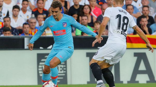 Griezmann goal earns Atletico first win of season Griezmann goal earns Atletico first win of season