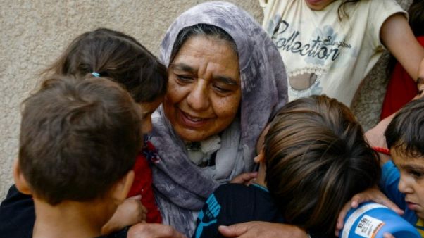 A Mossoul, la lutte quotidienne de Sana, grand-mère de 22 orphelins A Mossoul, la lutte quotidienne de Sana, grand-mère de 22 orphelins