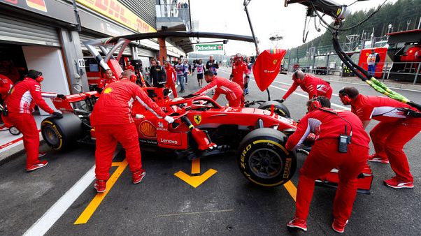 Vettel wins in Belgium to rein in Hamilton Vettel wins in Belgium to rein in Hamilton